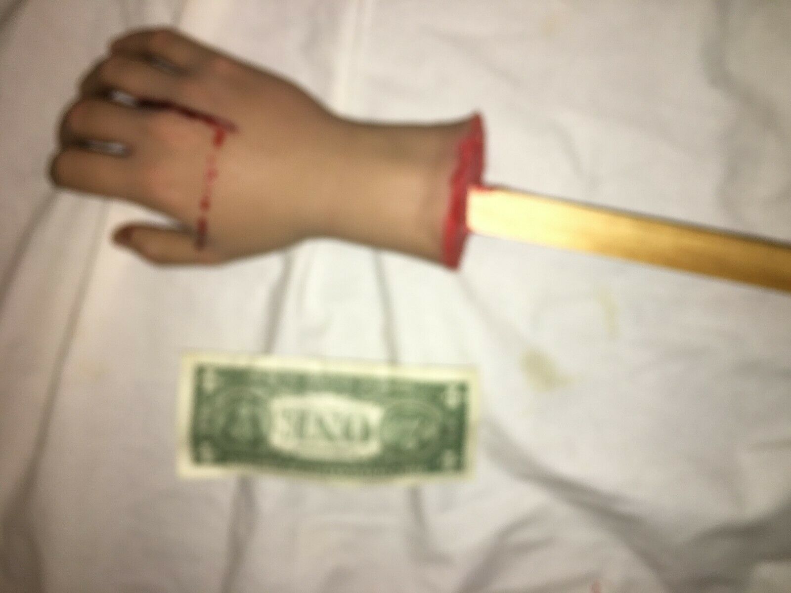 Screen used URETHANE HAND with SLIT FOR KNIFE. Gory, bloody HAND PROP.