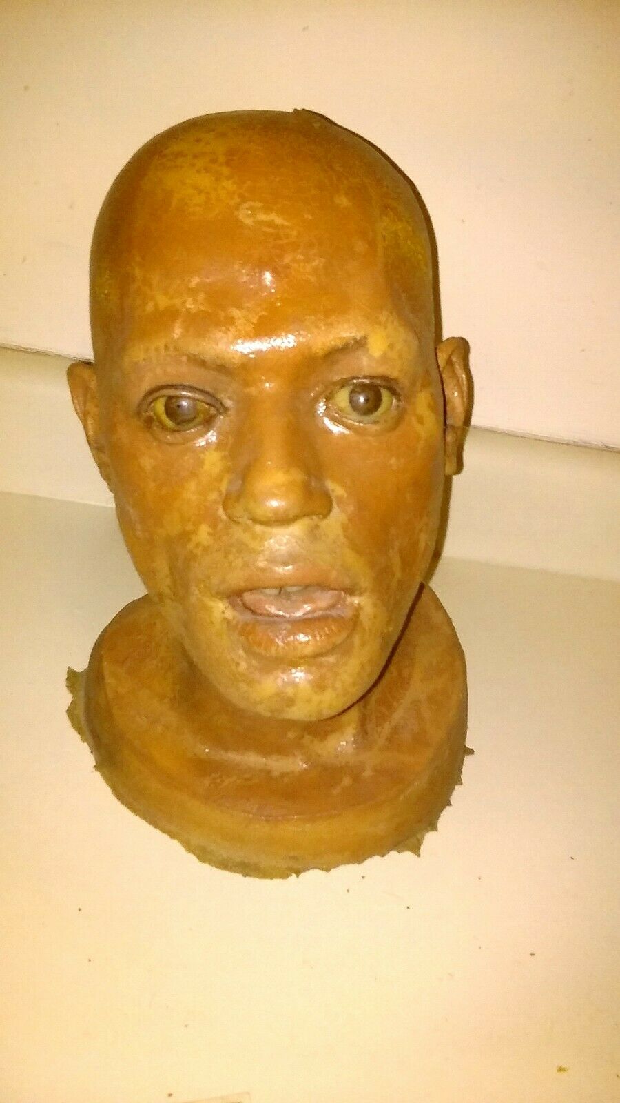 PROP HEAD  SIR LAURENCE FISHBURNE HEAD. Unknown production. Latex foam head.